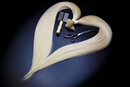 heart shaped hair extensions with brush and scissors