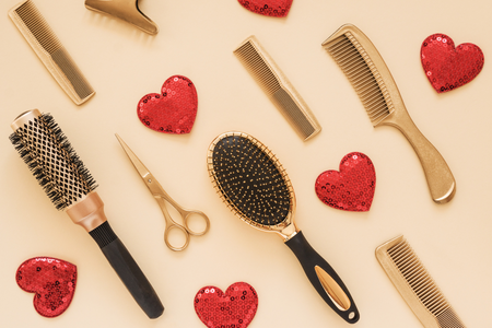 Gold brushes and combs with red hearts